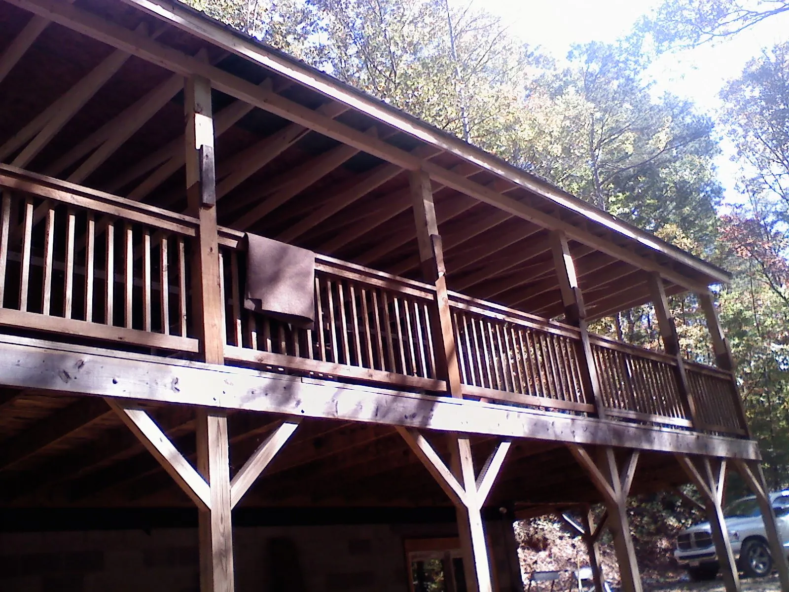 Timber framing under a new elevated porch and deck — Roof Leak Repair in Waltham by Roofing Brothers